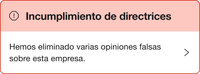 A Red warning alert banner that says "Breach of guidelines. We've removed a number of fake reviews for this company."